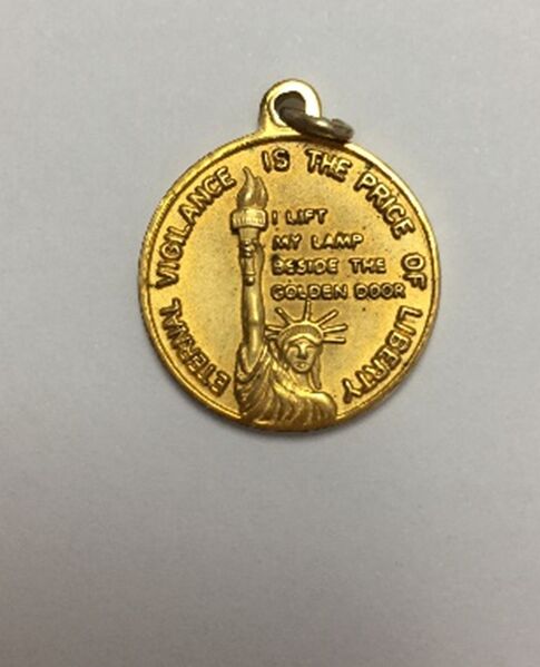 File:GoldenLilyPendant-reverse.jpg