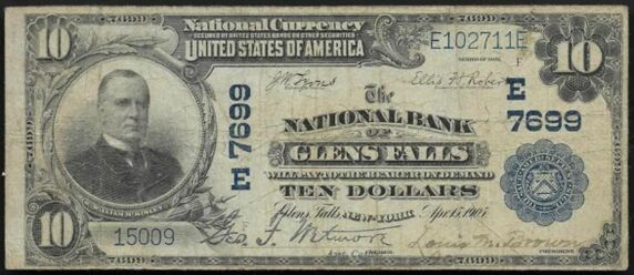 1902 Plain Back $10 bank note with pen signatures of George F. Wetmore, Assistant Cashier and Louis M. Brown, President.