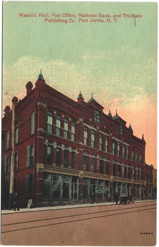 Postcard of the Farnum Building in Port Jervis, New York ca1900s. The National Bank of Port Jervis, Post Office, and Masonic Hall are shown.