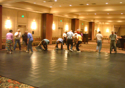 Laying down the dance floor}Laying down the dance floor for the 2005 Convention in Santa Clara