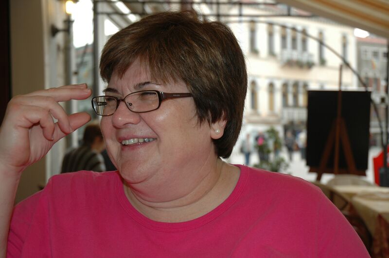 File:Arlene touching glasses.jpg