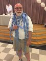 Ping DiBella winning a raffle at Times Squares' dance "The White Party", 2017