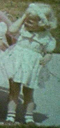 Tina as a child in 1960.png