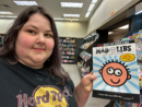 Rachel holding a Mad Libs book at Books‑A‑Million in Cookeville, TN on April 5, 2025