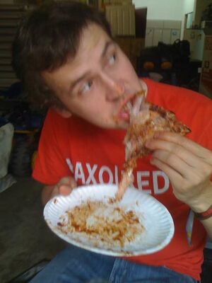 Eric Destroying Some Ribs.jpg