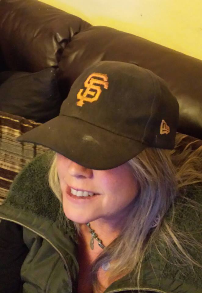 me watching the Giants in hat.jpg