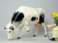 262 Grazing Cow, Black/white