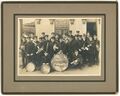 Sterling Band posing in front of the Quinby Realty Co., ca 1920s